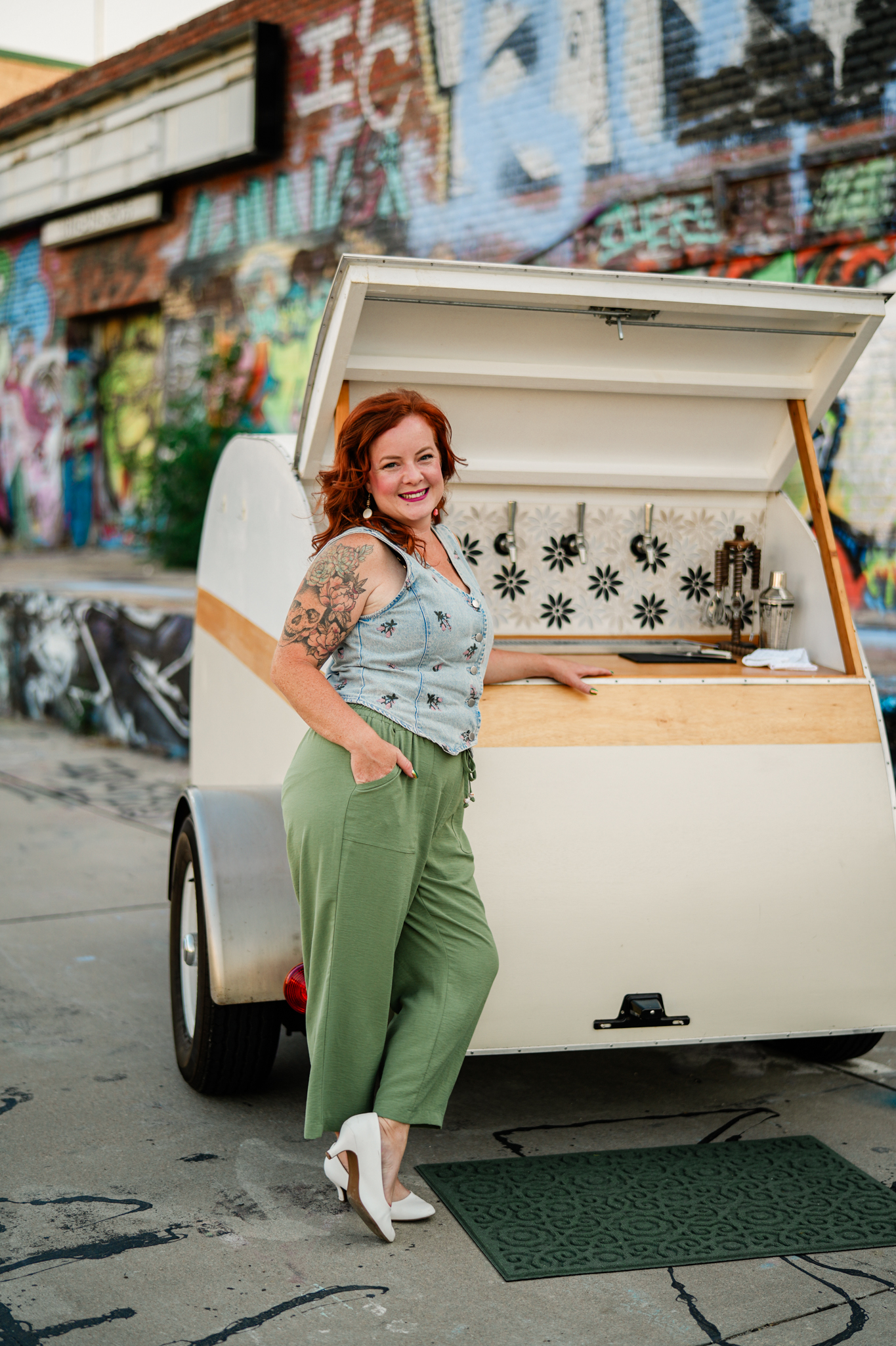 Aubre serving drinks from the Bar 59 mobile bar trailer